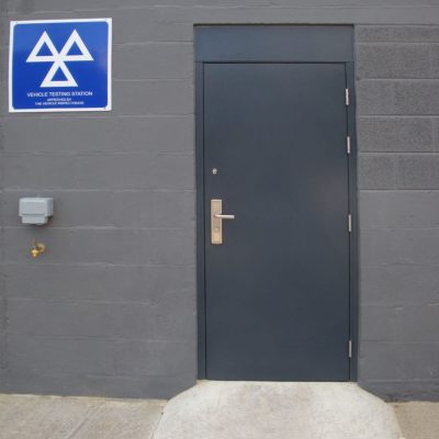 Anthracite grey door at a MOT garage