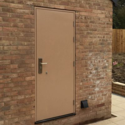Garage side door in Beige