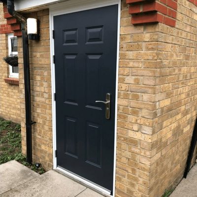 anthracite grey 6 panel steel door in white frame