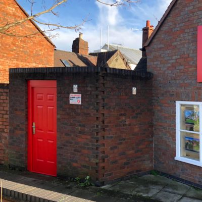 red panelled steel door fitted