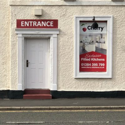 white panelled steel door on shop