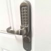 conversion kit installed onto a code lock fitted to a door