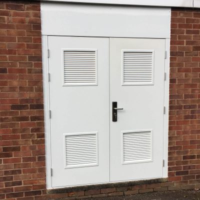 White double louvred door with over head panel
