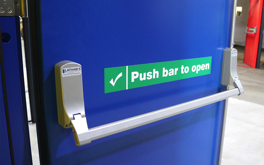 Image of blue fire exit door fitted with an Exidor panic bar
