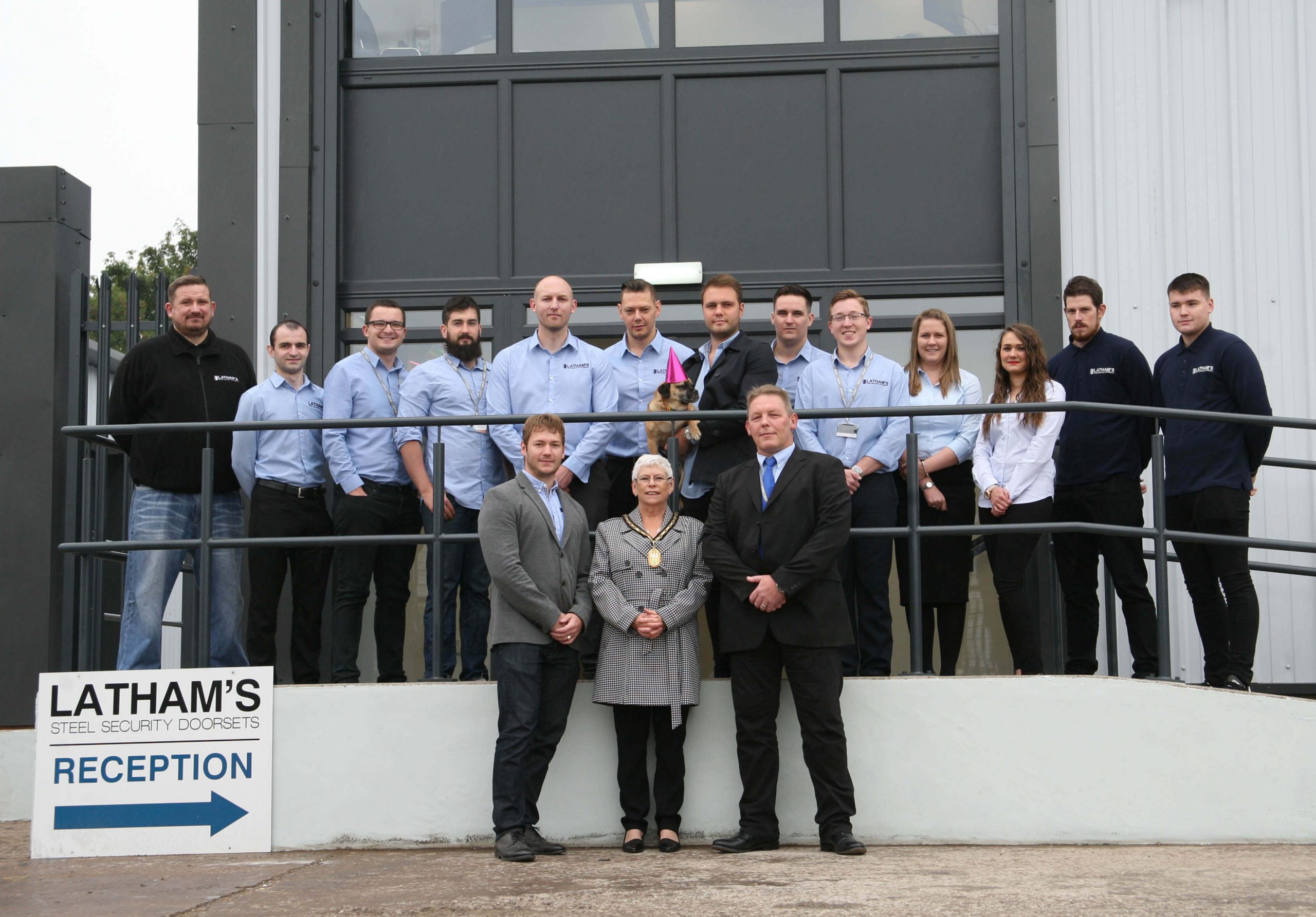 Latham's staff, and Sandwell Deputy Mayor outside their new offices