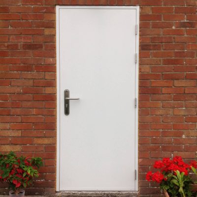 White PAS24 door fitted to garage