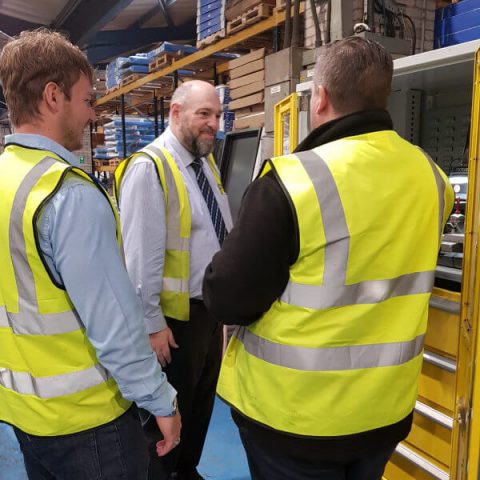 Alex and Dale from Lathams showing Jan Britton around the manufacturing facility