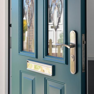 panelled front door showing letterplate