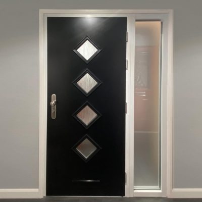 Black steel door with sidelight