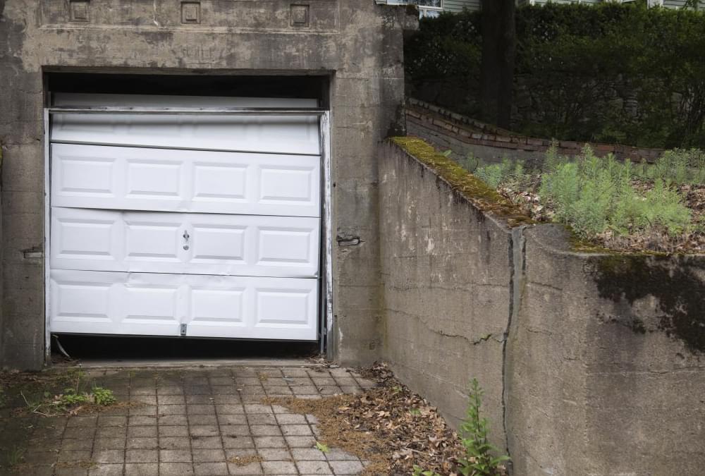 Broken into garage door