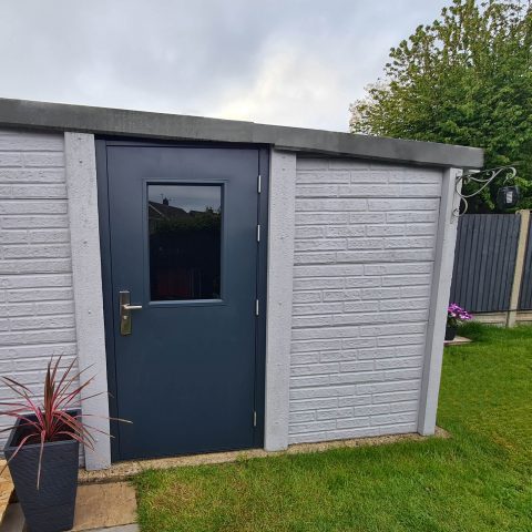 Glazed steel garage side door in anthracite grey