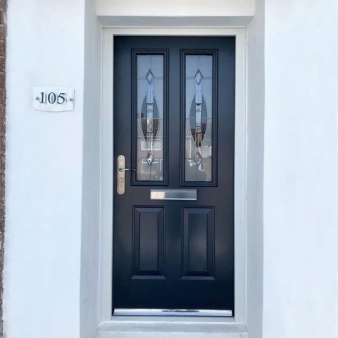 Anthracite grey panelled front door with fancy glass