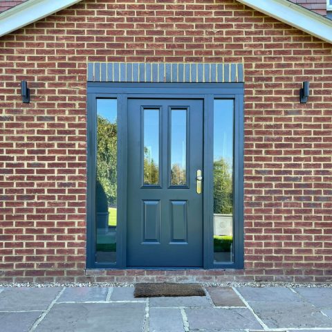 6 Panelled front door with side lights in anthracite grey