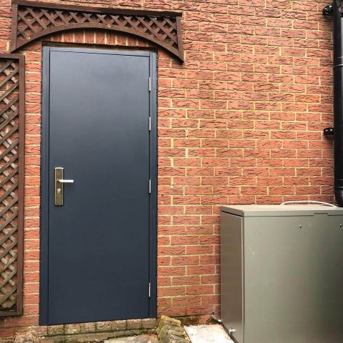 Personnel access door on house