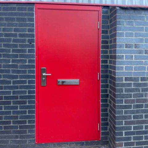 Red budget steel door with letterbox