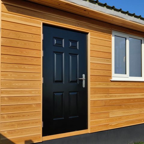 Shed door in security panelled