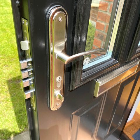 6 Panel Front door handle and lock close up