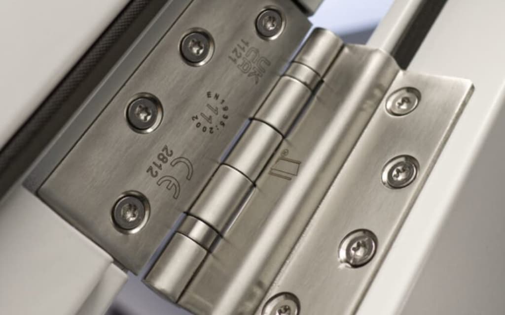 Close up of a Latham's stainless steel hinge