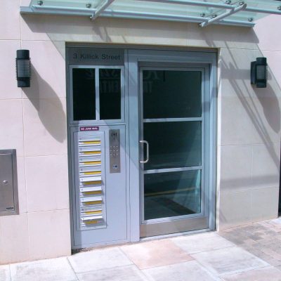 Light blue commercial entrance door