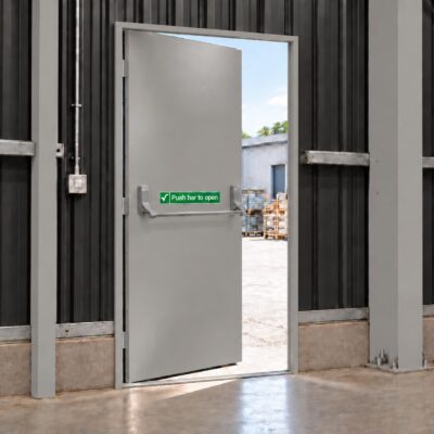 A Grey Latham's Fire Exit Door installed in a steel frame building