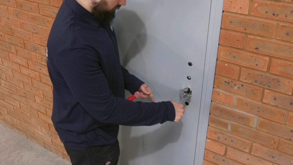Burglar breaking into property