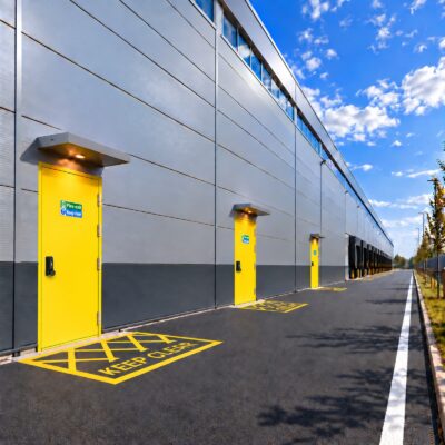 Traffic Yellow secured by design fire exit doors with OAD's